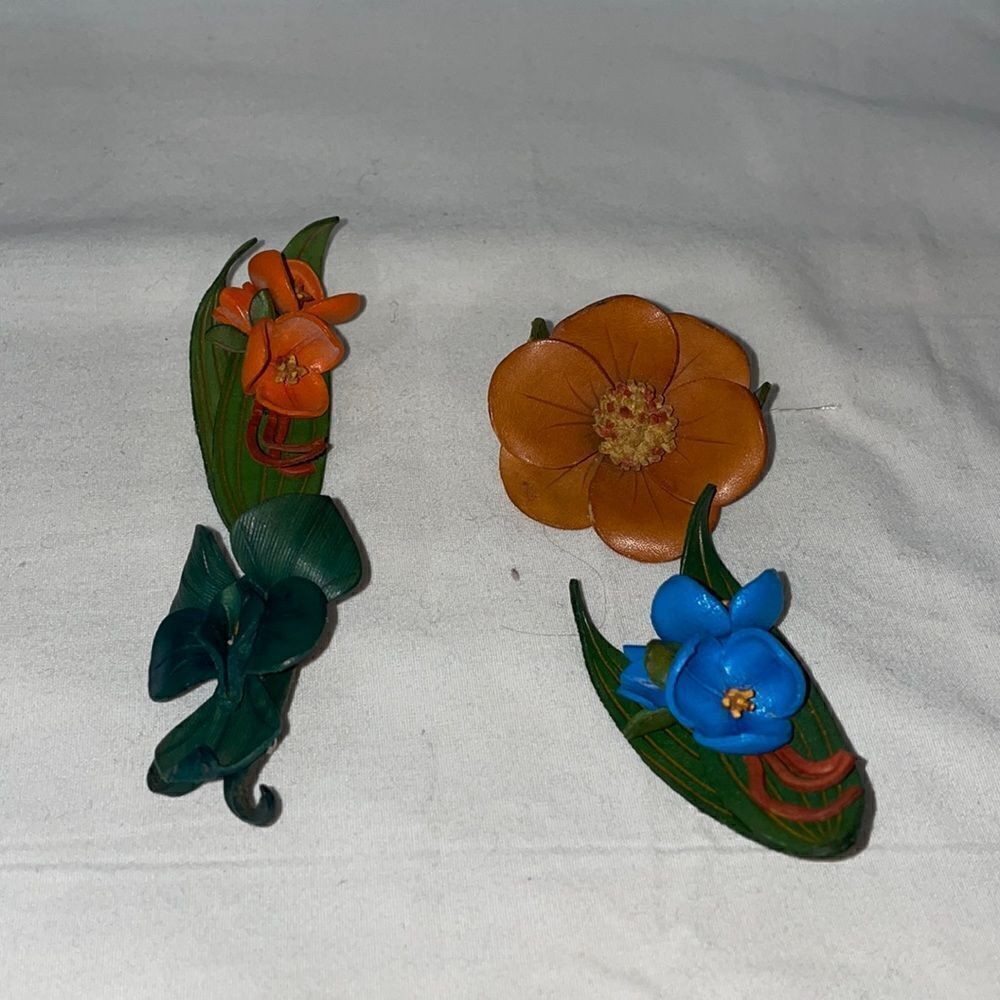 Four flower pins  